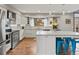 Spacious kitchen featuring stainless steel appliances, granite countertops, and a center island with seating at 1123 E 132Nd Way, Thornton, CO 80241
