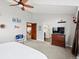 Spacious main bedroom with neutral carpeting and an ensuite bathroom featuring a glass enclosed shower at 1123 E 132Nd Way, Thornton, CO 80241
