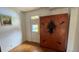 Cozy bedroom featuring a murphy bed, hardwood floors, and a sunlit window, perfect for a comfortable and stylish living space at 2320 22Nd St, Boulder, CO 80304