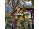 Charming yellow house framed by a colorful arched entry at 2320 22Nd St, Boulder, CO 80304
