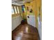 Interior shot of unique home with stained glass, spiral stairs and hardwood flooring at 2320 22Nd St, Boulder, CO 80304