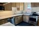 Functional kitchen with stainless steel appliances, ample cabinet space, and a clean countertop, ideal for cooking and meal preparation at 2320 22Nd St, Boulder, CO 80304