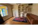 Cozy living room with hardwood floors, built-in shelving, and lots of natural light at 2320 22Nd St, Boulder, CO 80304