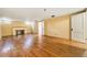 This basement area features hardwood floors, a fireplace, and natural light at 2285 N Monaco Pkwy, Denver, CO 80207