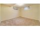 This basement offers neutral carpet, and natural light at 2285 N Monaco Pkwy, Denver, CO 80207
