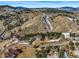 A beautiful aerial view of this house and the surrounding landscape at 457 Buena Vista Rd, Golden, CO 80401
