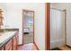 Bathroom with shower/tub, vanity, and view into bedroom at 457 Buena Vista Rd, Golden, CO 80401