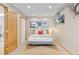 Finished basement bedroom with wood-paneled walls at 27218 Mountain Park Rd, Evergreen, CO 80439