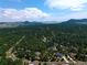 Aerial community view, showcasing houses and landscape at 7350 Fremont Pl, Larkspur, CO 80118