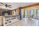 Open concept dining area with a rustic wooden table at 7350 Fremont Pl, Larkspur, CO 80118