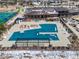 Aerial shot showcasing the community pool, lounge area, and surrounding landscape at 22580 E Eads Cir, Aurora, CO 80016