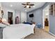 Bedroom with blue accent wall, carpeted floors, and open closet at 22580 E Eads Cir, Aurora, CO 80016