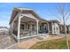 Charming home featuring a stone facade and welcoming porch at 22580 E Eads Cir, Aurora, CO 80016