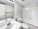 Clean bathroom featuring a white bathtub, toilet, and sink at 9010 W 88Th Cir, Westminster, CO 80021