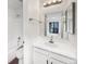 Clean bathroom with vanity, mirror, and shower/tub combo at 9010 W 88Th Cir, Westminster, CO 80021