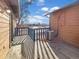 Private deck with views of the surrounding area and a glimpse of parking at 9010 W 88Th Cir, Westminster, CO 80021