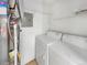 Laundry room with washer, dryer and shelving at 9010 W 88Th Cir, Westminster, CO 80021