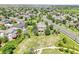 Wonderful aerial image of a suburban home in a neighborhood with mature trees, walking trails, and parks at 16500 Hitching Post Cir, Parker, CO 80134