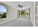 Bright bedroom with large windows offering lush backyard views at 16500 Hitching Post Cir, Parker, CO 80134