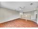 Bonus room with wood floors, ceiling fan and track lighting at 16500 Hitching Post Cir, Parker, CO 80134