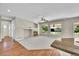 Bright open floor plan with fireplace, great natural light, and open access to kitchen at 16500 Hitching Post Cir, Parker, CO 80134