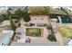 An aerial view of a spacious backyard complete with patio, shed, garden area and privacy fence at 17145 Park Trail Dr, Monument, CO 80132