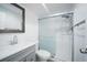 Clean bathroom featuring a modern vanity and a shower with sliding glass doors at 17145 Park Trail Dr, Monument, CO 80132
