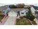 Charming single-story home features a well-maintained lawn, mature trees and an attached two-car garage at 17145 Park Trail Dr, Monument, CO 80132