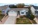 Charming single Gathering home featuring a well-manicured lawn and a two-car garage at 17145 Park Trail Dr, Monument, CO 80132