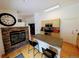 Kitchen with an island, stainless steel appliances, and stone fireplace viewed from the living room at 17145 Park Trail Dr, Monument, CO 80132