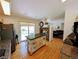 Spacious kitchen with a functional island, modern appliances, and an open layout to the living area at 17145 Park Trail Dr, Monument, CO 80132