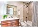 Clean bathroom with tub and shower, plus modern vanity at 6220 Arapahoe Dr, Evergreen, CO 80439