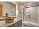 Bathroom with copper sink and walk-in shower at 6220 Arapahoe Dr, Evergreen, CO 80439