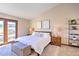 Spacious main bedroom with private access to balcony at 6220 Arapahoe Dr, Evergreen, CO 80439