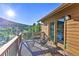 Deck with mountain views and access to home at 6220 Arapahoe Dr, Evergreen, CO 80439