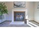 Modern gas fireplace with white surround at 6220 Arapahoe Dr, Evergreen, CO 80439