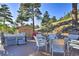 Hot tub and fire pit on deck with mountain views at 6220 Arapahoe Dr, Evergreen, CO 80439