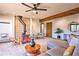 Living room with wood stove and comfortable seating at 6220 Arapahoe Dr, Evergreen, CO 80439