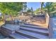 Stairs leading up to deck and patio at 6220 Arapahoe Dr, Evergreen, CO 80439