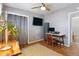 Functional home office with hardwood floors, natural light and built in storage space at 3383 S Boston Ct, Denver, CO 80231
