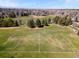 Aerial view of a large soccer field with clearly marked boundaries, perfect for sports and recreation at 3383 S Boston Ct, Denver, CO 80231