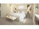 Bright bedroom with a cozy bed, stylish furniture, and natural light at 2261 W Briarwood Ave, Littleton, CO 80120