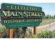 Signage for Littleton Main Street Historic District, showcasing its heritage and location at 2261 W Briarwood Ave, Littleton, CO 80120