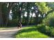 Scenic view of walking path and lush greenery at 2261 W Briarwood Ave, Littleton, CO 80120