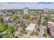 Aerial view of urban neighborhood featuring diverse architecture, lush trees, and community gardens at 200 N Sherman St # 2, Denver, CO 80203