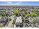 High-angle captures a charming neighborhood with tree-lined streets and varied architectural styles at 200 N Sherman St # 2, Denver, CO 80203