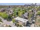 Stunning aerial view of the apartment building amidst a vibrant neighborhood, offering a glimpse of the city skyline in the distance at 200 N Sherman St # 2, Denver, CO 80203