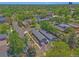 An aerial view of a property showcasing its neighborhood and surrounding green trees at 2955 N Gilpin St, Denver, CO 80205