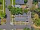 Aerial view of the multi-Gathering home and tree-lined street showcasing nearby street parking at 2955 N Gilpin St, Denver, CO 80205