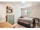 Comfortable bedroom with hardwood floors, a large window, and modern furnishings at 2955 N Gilpin St, Denver, CO 80205